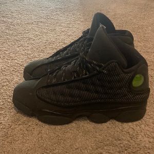 These are Air Jordan 13 Retro Black Cat in the size 6.5 Y